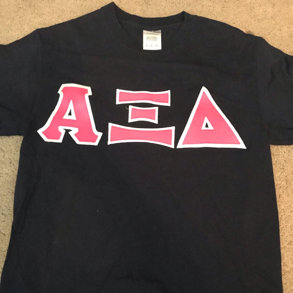 Navy and pink stitched letter shirt